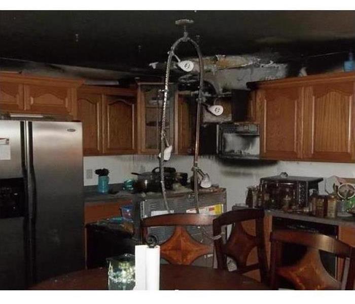 Kitchen damaged after a small fire 